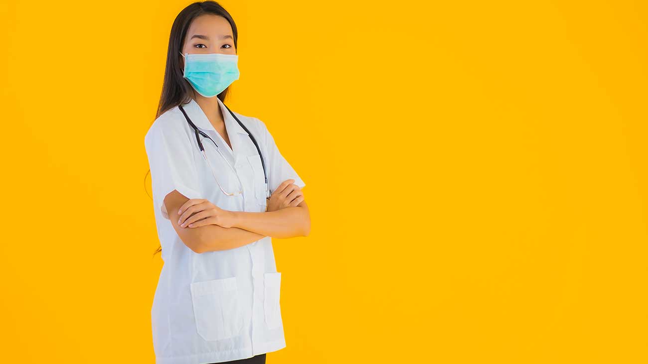 Ebola US Case Nurse Doctor with Mask Photo