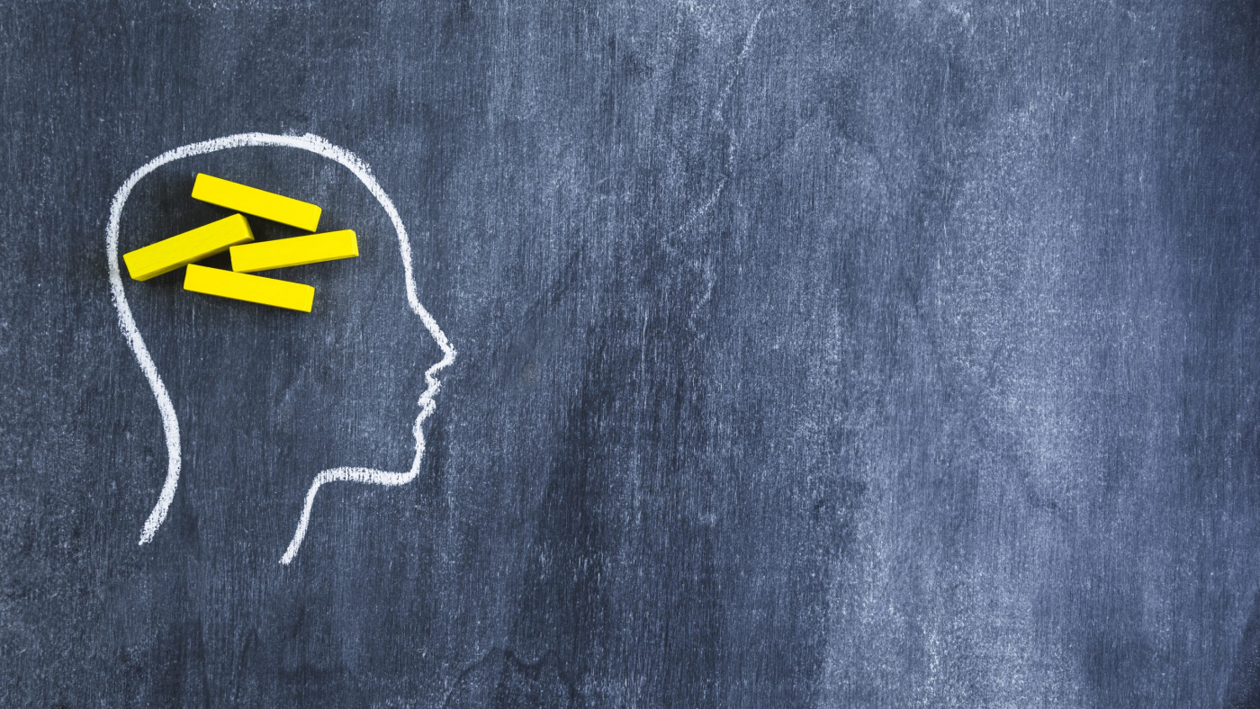yellow-rectangular-wooden-box-drawn-face-outline-with-chalk-blackboard