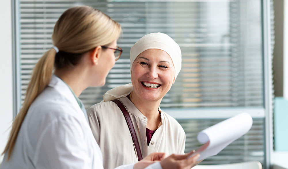 Woman With Breat Cancer Talking to Physician