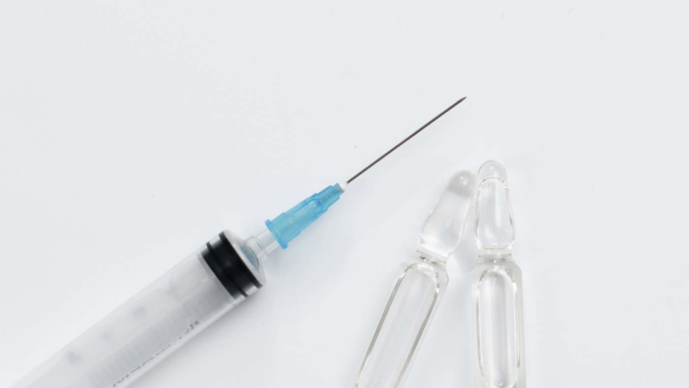Covid Treatment | Image of Vaccine and Needles