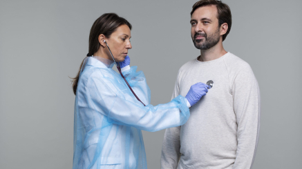 portrait-woman-wearing-medical-gown-male-patient