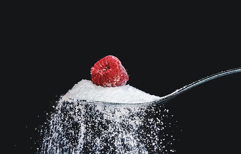 Diabetes and Sugar Connections Image of Spoon and Sugar