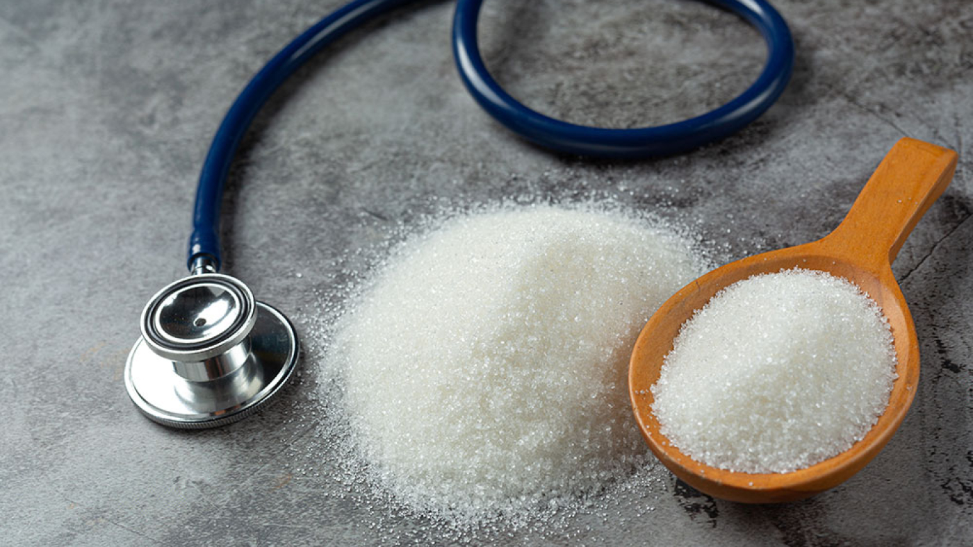 Diabetes lllustration Showing Sugar on Table Next to Stethascope