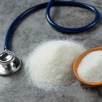 Diabetes lllustration Showing Sugar on Table Next to Stethascope