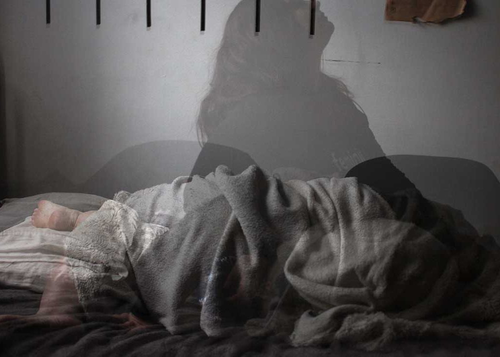 Insomnia and Depression Relationship and Effects Image of Person Restless Sleep