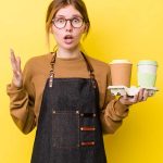 Woman Surprise Holding 2 Cups of Coffee