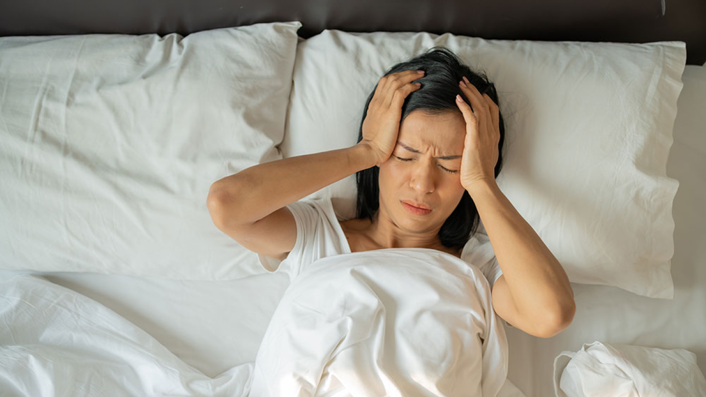 Woman Un Happy Lies in Bed Awake Due to Insomnia