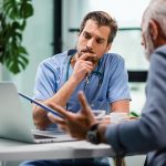 Worried Doctor Consults Over Low Blood Sugar Levels with Patient