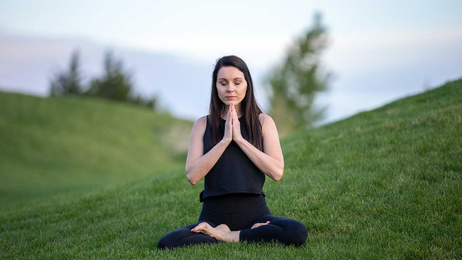 Meditation Photo of Woman Meditating in Field