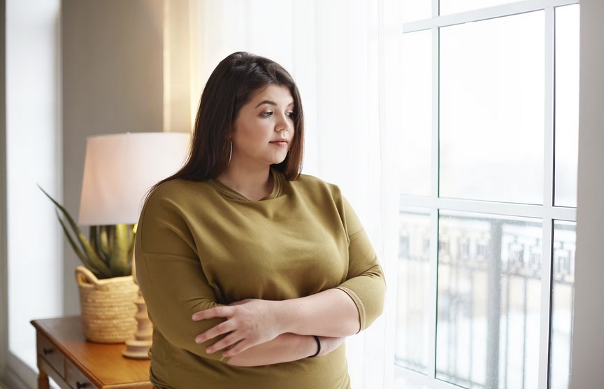 Woman Looking Depressed Due to Obesity and Being Overweight